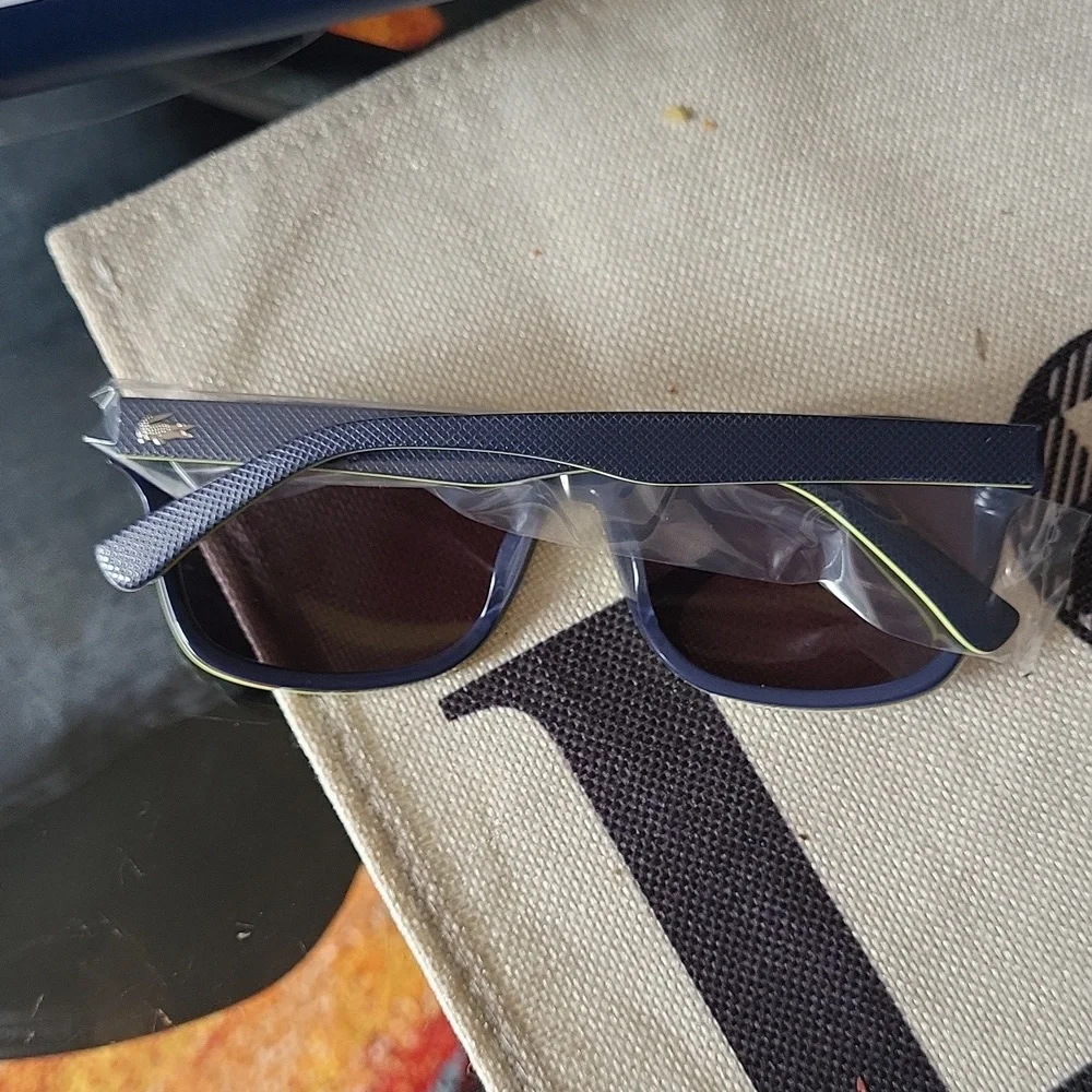 Lacoste gorgeous sunglasses dark blue yellow bagged tagged Unisex